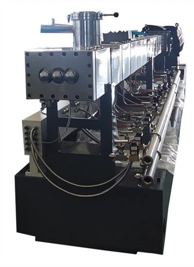 Máy đùn trục vít ba 65T